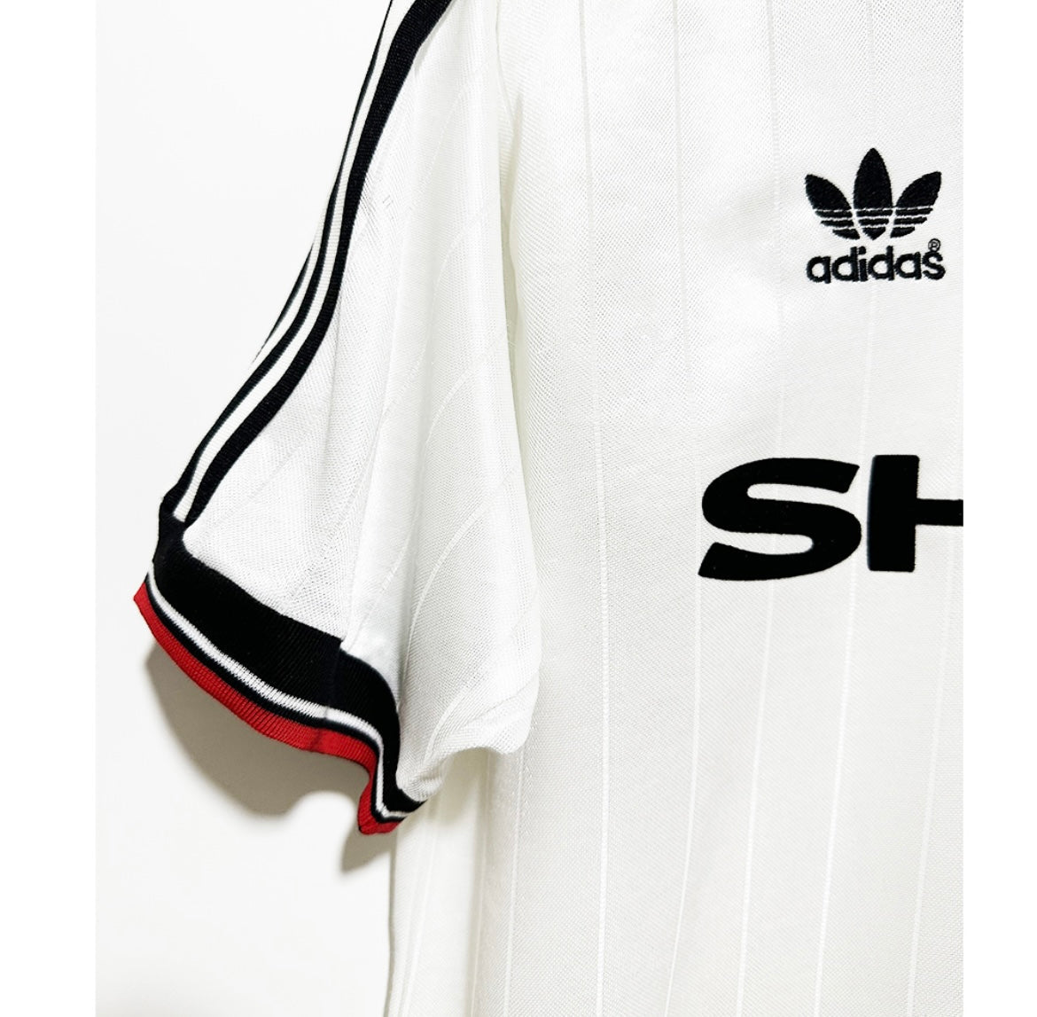 MANCHESTER UNITED - MAILLOT EXTÉRIEUR 1982/83