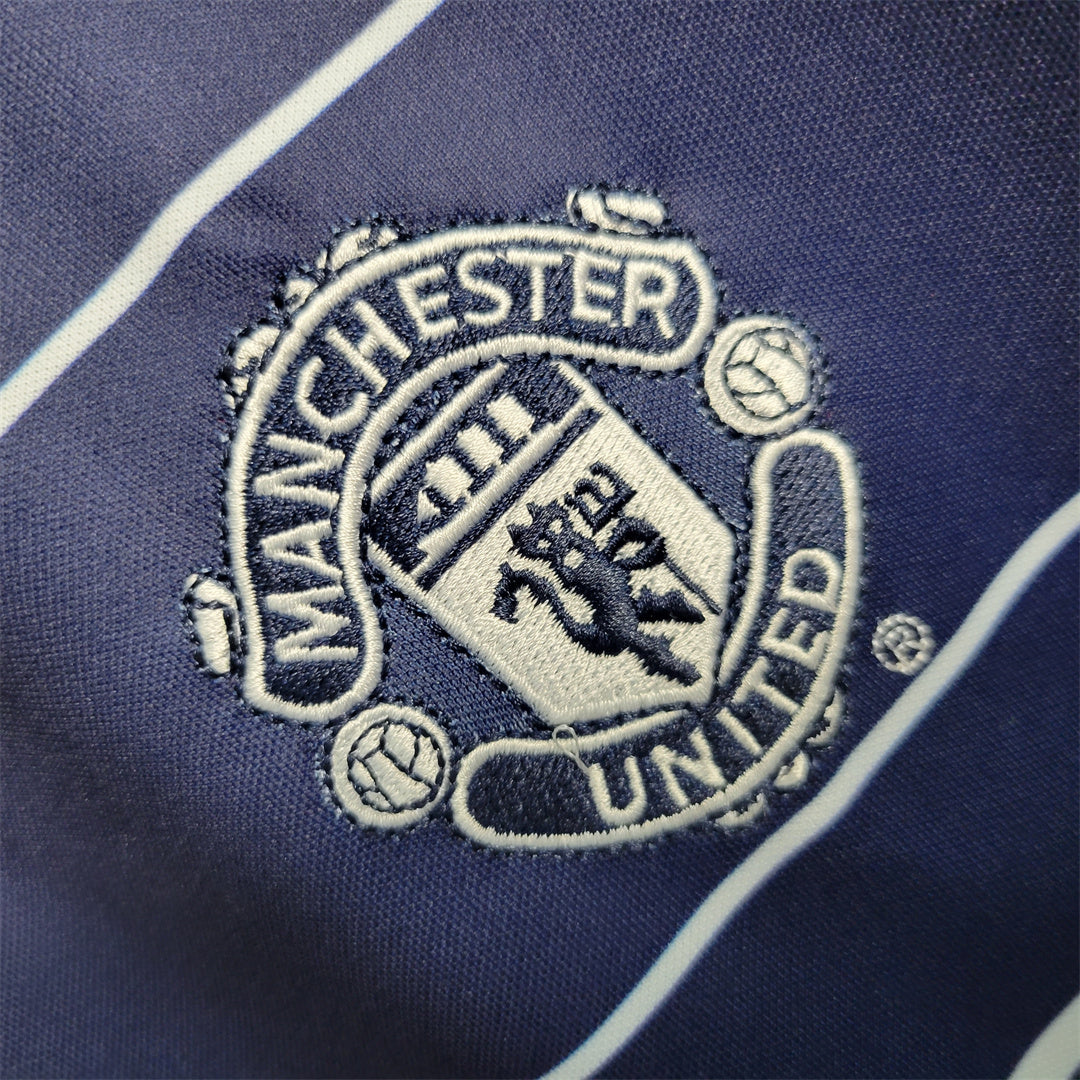 MANCHESTER UNITED - MAILLOT EXTÉRIEUR RETRO 99/00