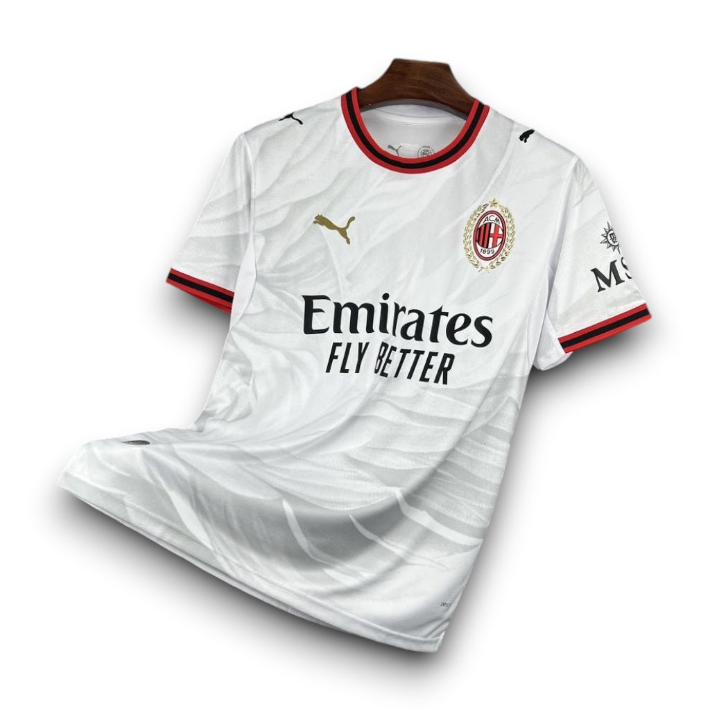 Leazofoot AC Milan 26/27 away jersey in white with red and black trim, gold Puma logo, and team crest.
