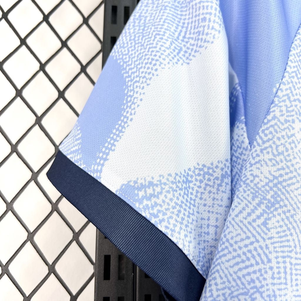 Leazofoot AJAX third football jersey 26/27, light blue and white with a geometric pattern and navy trim.