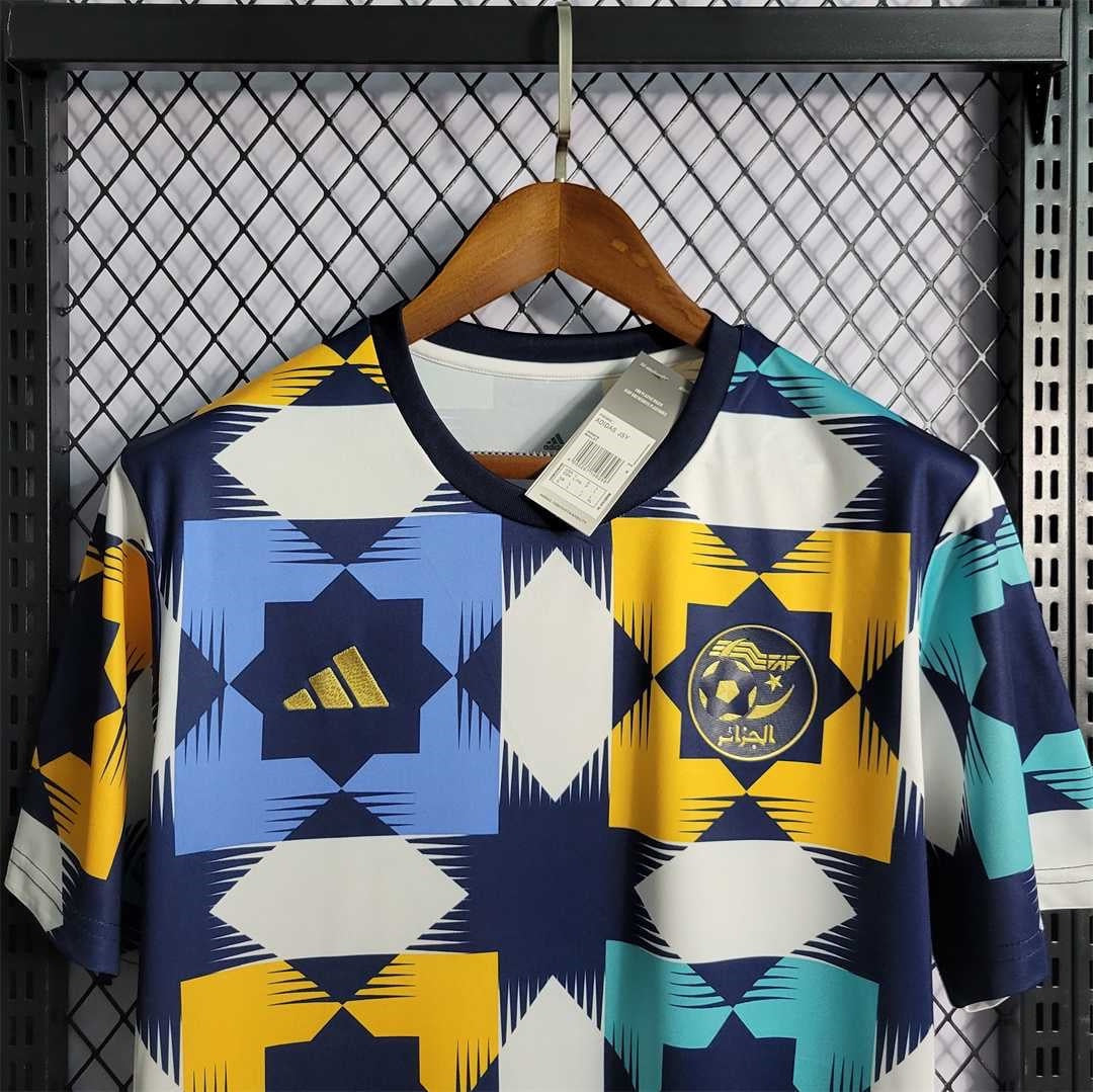 Leazofoot Algeria 2022 training jersey with geometric blue, yellow, and white pattern and gold team crest
