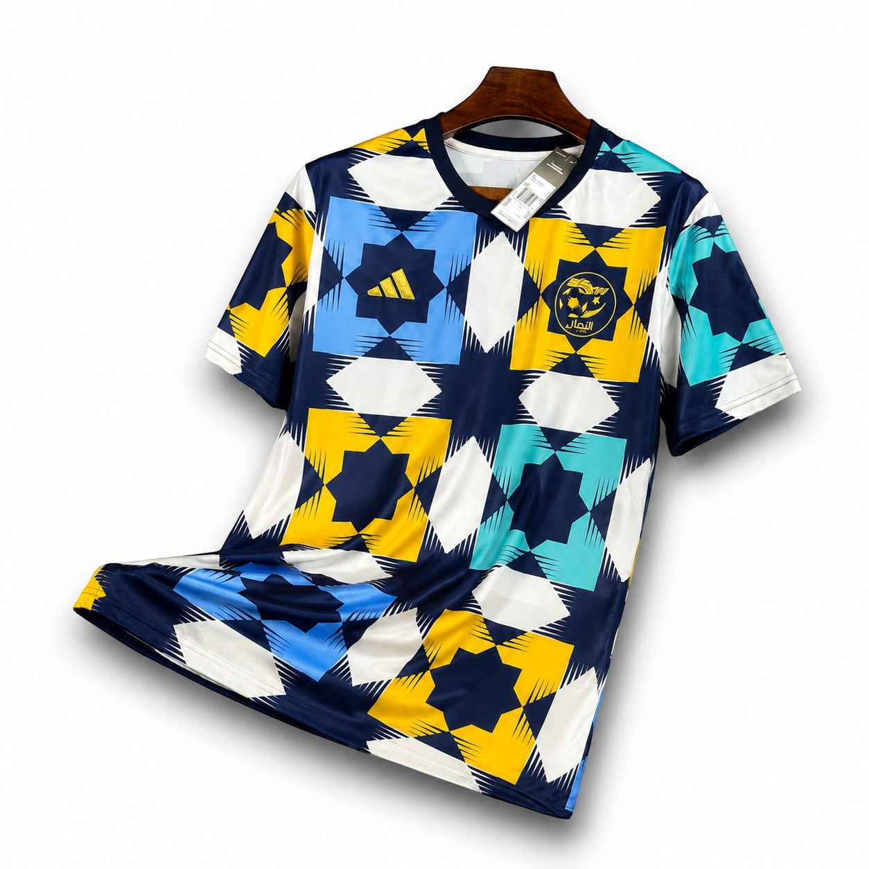 Leazofoot Algeria 2022 training jersey featuring a geometric star pattern in navy, yellow, white, and light blue.
