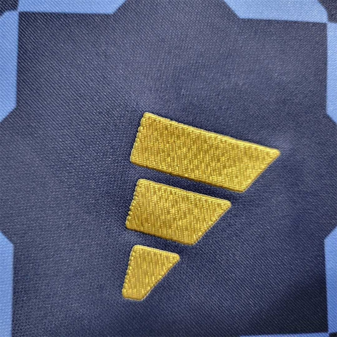 Leazofoot Algeria 2022 training jersey featuring a navy and light blue geometric pattern with a gold adidas logo.