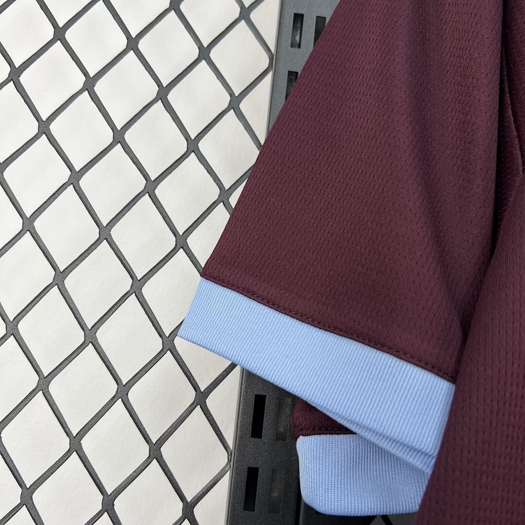 Leazofoot Aston Villa 26/27 home jersey featuring a burgundy mesh fabric with light blue ribbed sleeve cuffs.