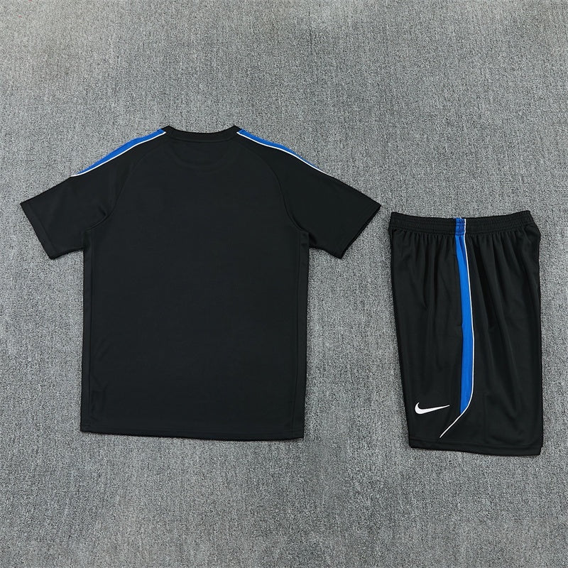 Leazofoot Atletico Madrid 26/27 black training set with blue and white side stripes on shirt and shorts