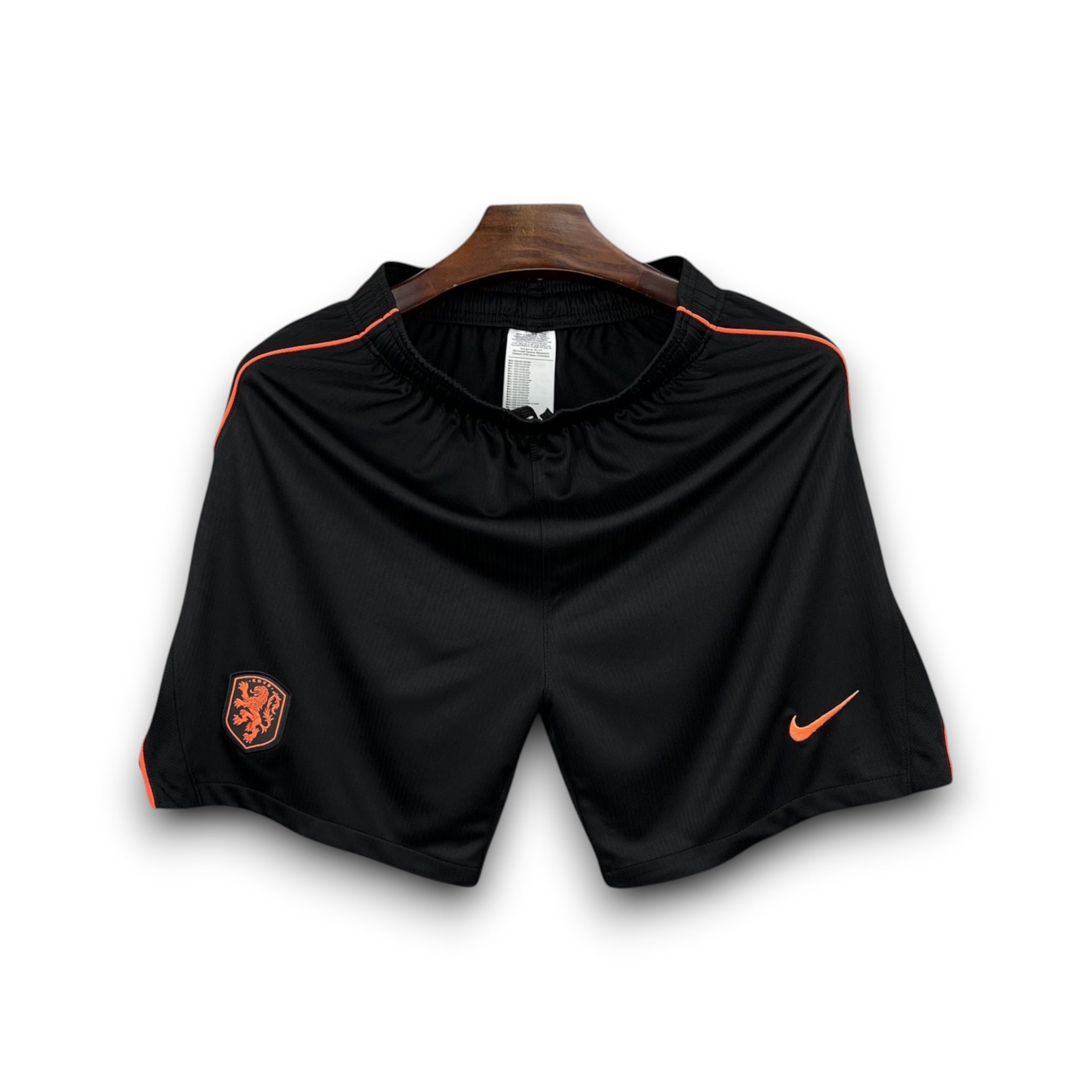 Leazofoot black soccer shorts with orange trim and Netherlands crest. Nike logo on right leg.