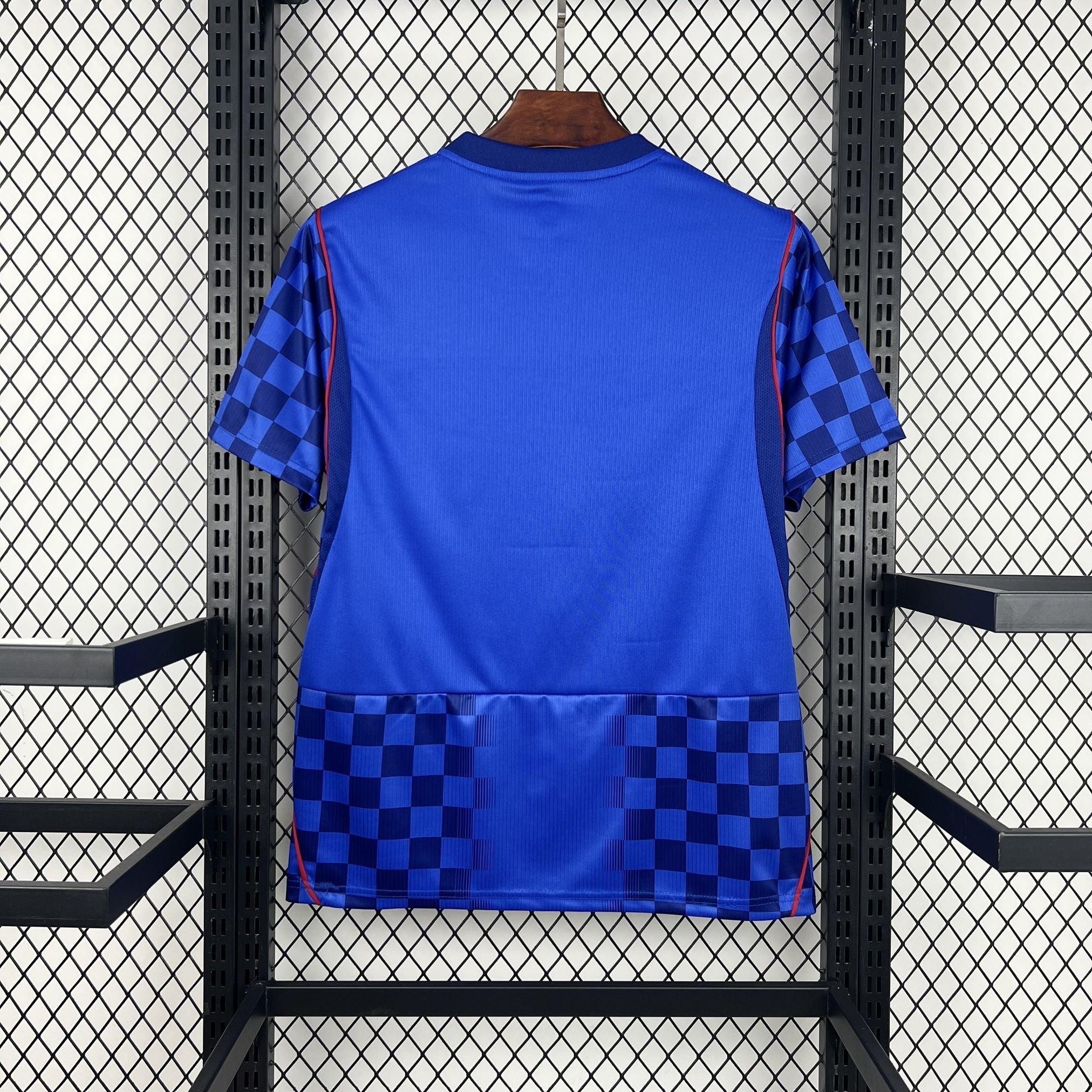Leazofoot blue soccer jersey with checkered sleeves and hem, red trim, 2026 away kit