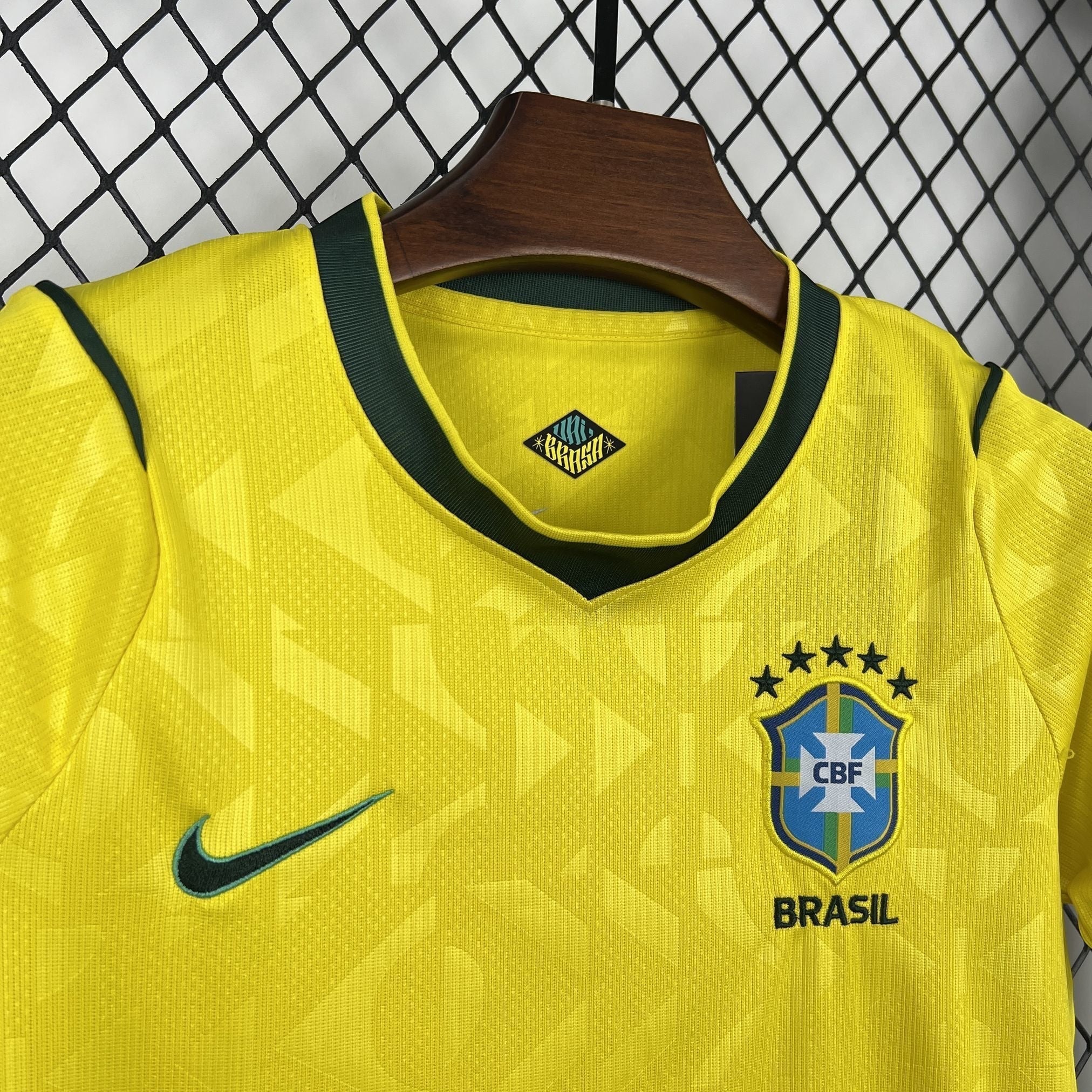 Leazofoot Brasil kids' home soccer jersey, yellow with green trim and CBF crest. Features Nike swoosh logo.