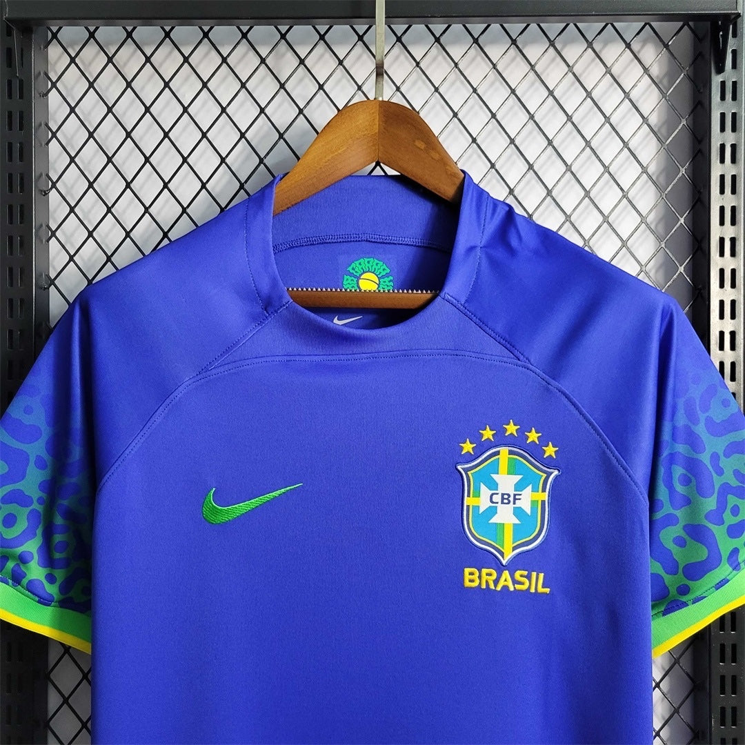 Leazofoot Brazil 2022 away soccer jersey in blue with green leopard print sleeve details and team crest.