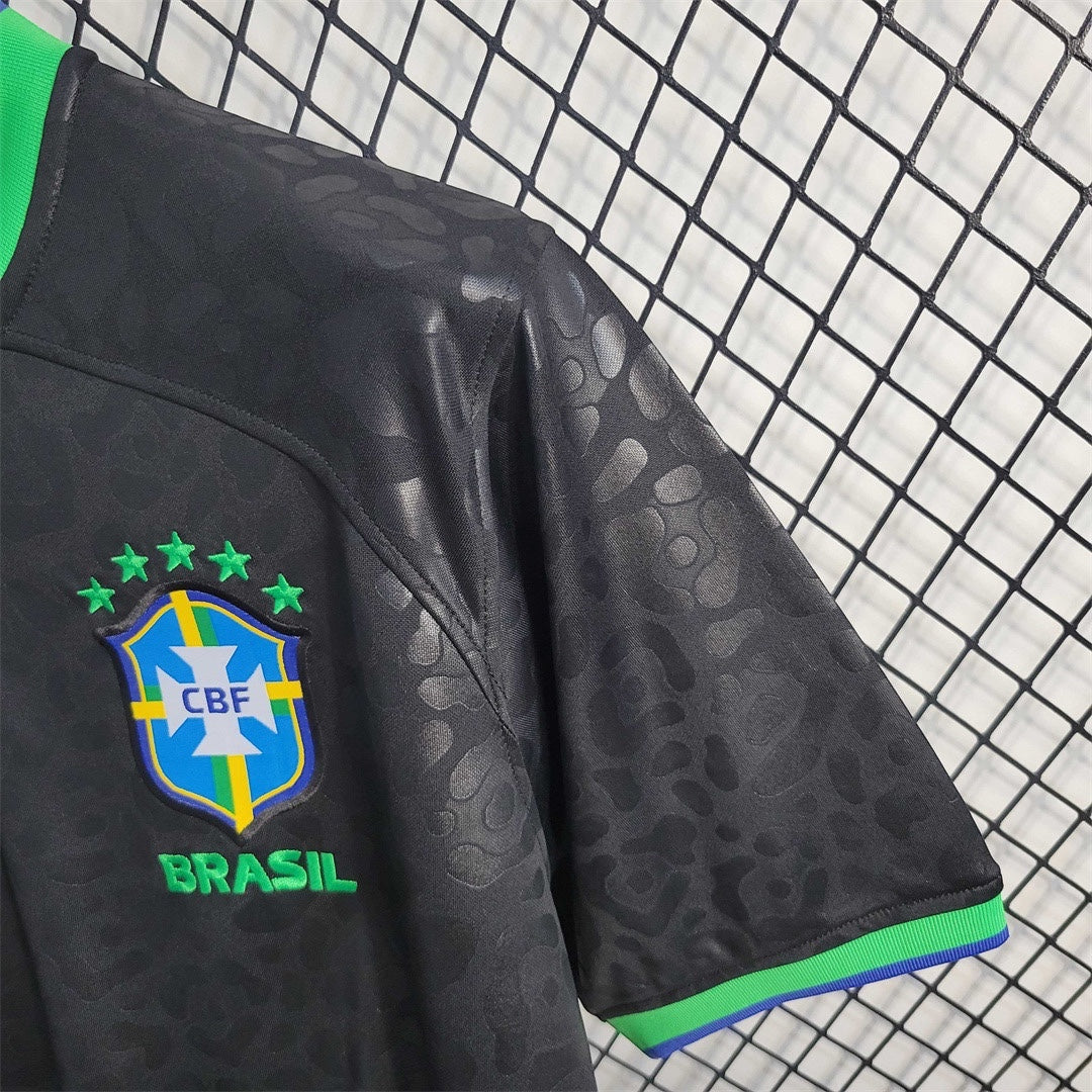 Leazofoot Brazil 2023 concept soccer jersey in black with tonal animal print, green trim, and embroidered CBF crest.