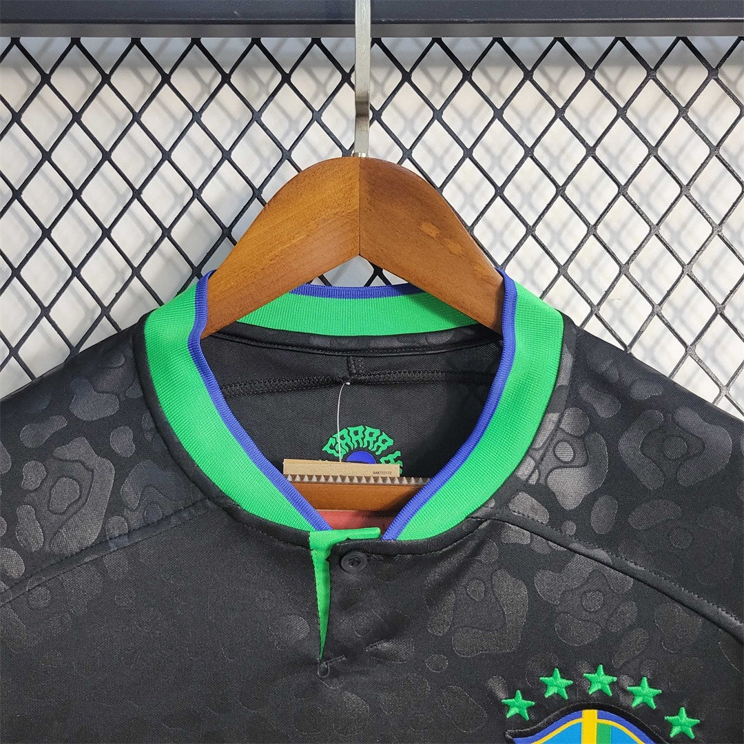 Leazofoot black Brazil 2023 concept soccer jersey with green and blue collar and subtle leopard print pattern.