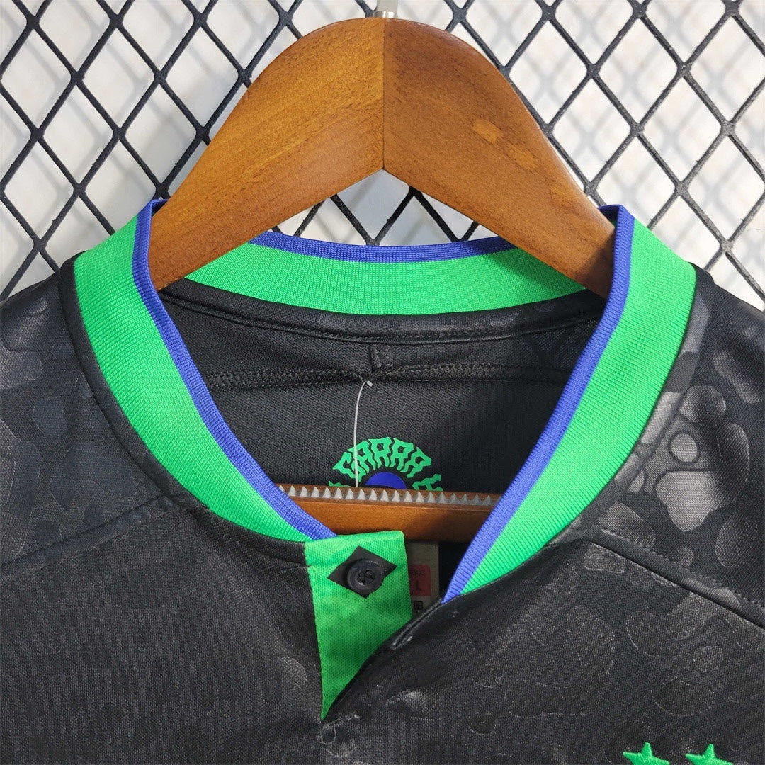 Leazofoot Brazil 2023 concept soccer jersey featuring a black patterned fabric with green and blue collar details.