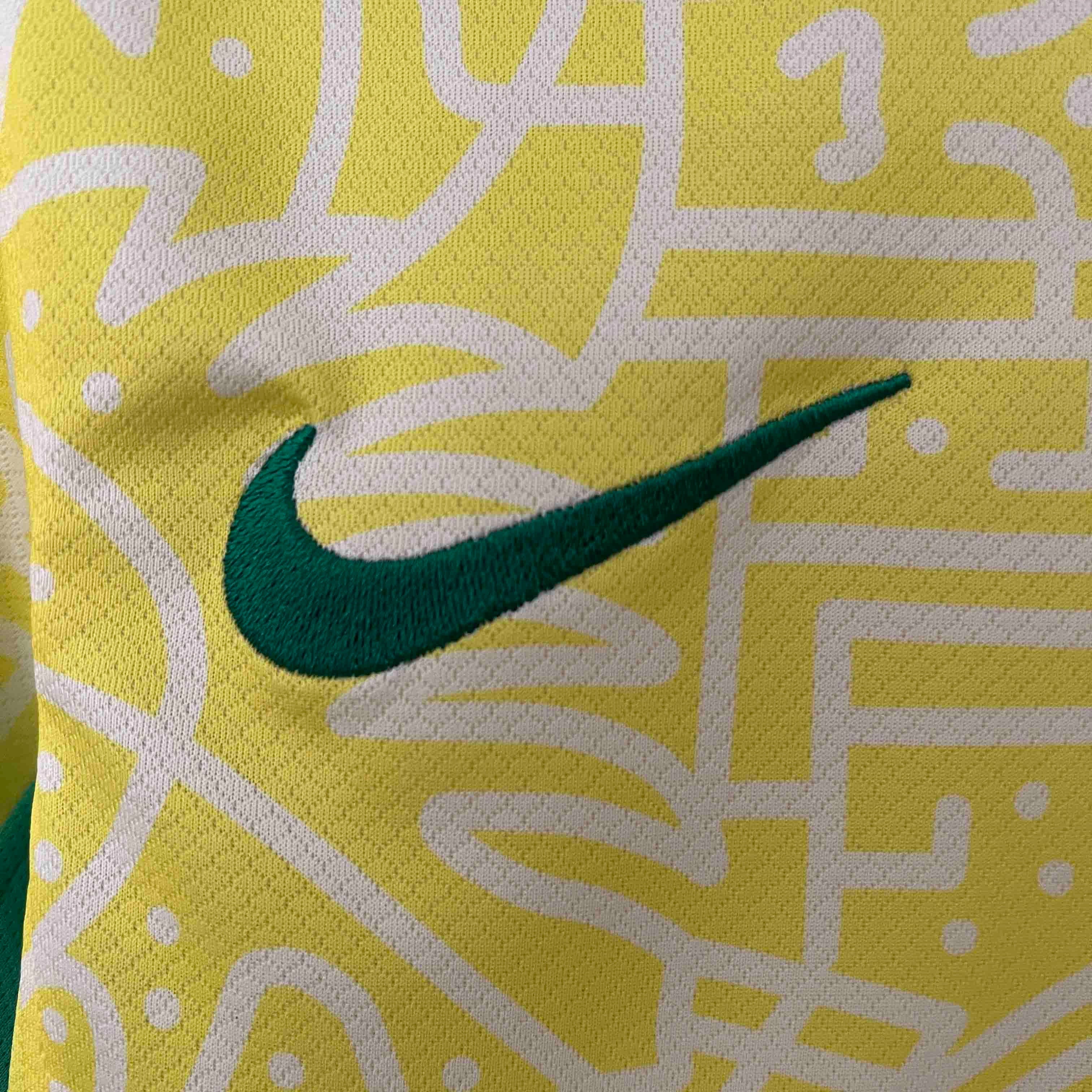 Leazofoot Brazil 2024 home jersey featuring a yellow fabric with a white geometric pattern and embroidered green swoosh