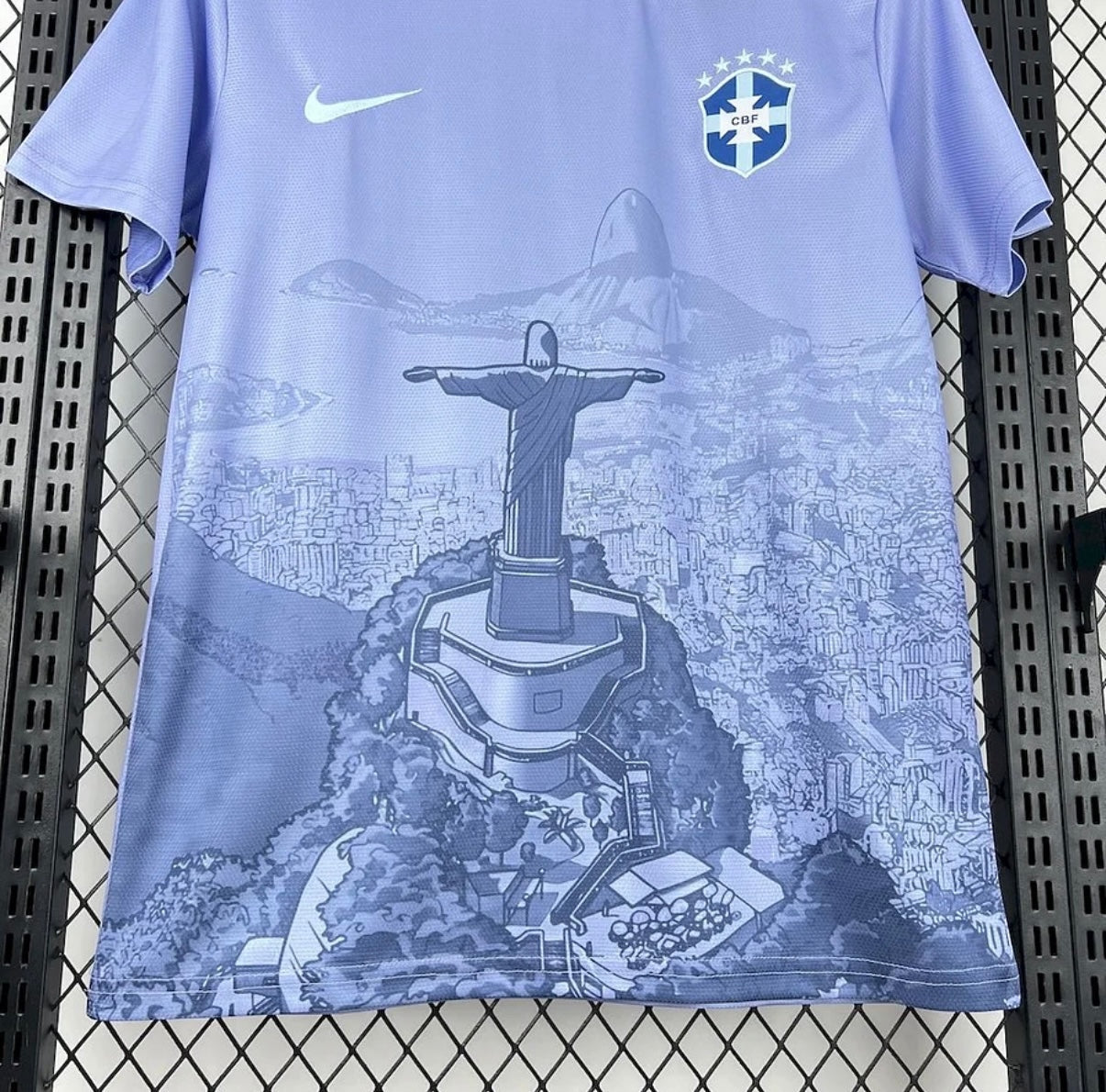 Leazofoot light purple Brazil 2025 concept soccer jersey featuring a graphic print of Christ the Redeemer in Rio.