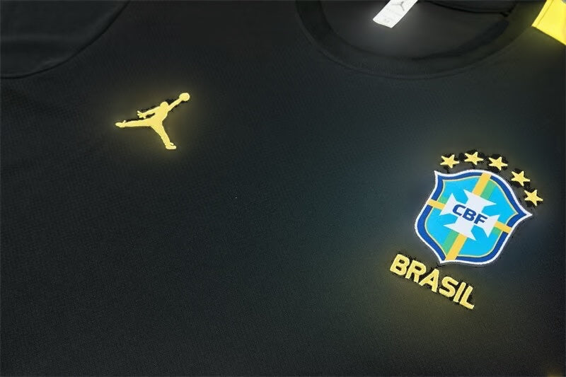 Leazofoot Brazil 2026 training jersey in black with gold Jumpman logo and CBF crest