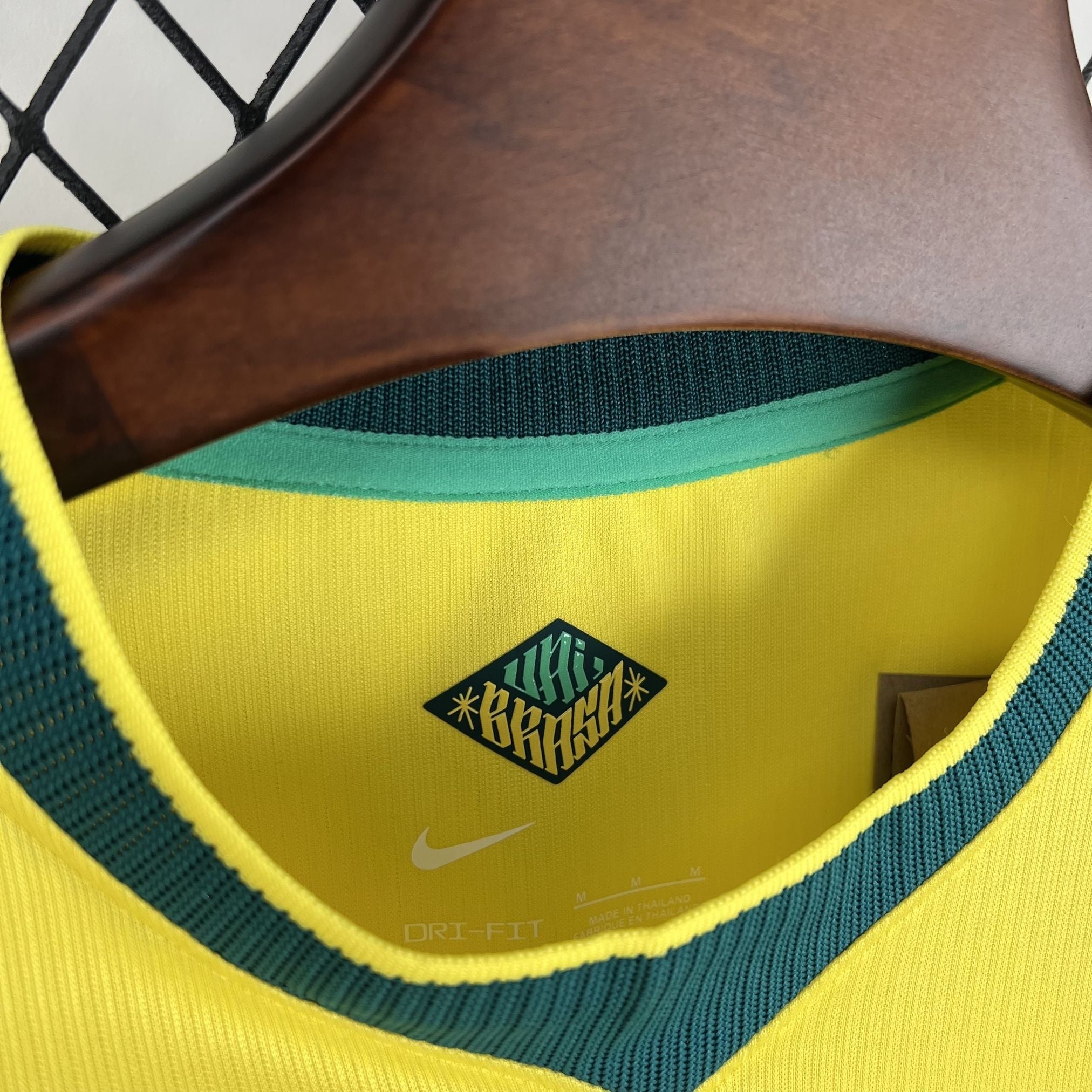 Leazofoot Brazil long sleeve home jersey 2026 in yellow with green trim and a diamond-shaped BRASIL graphic.