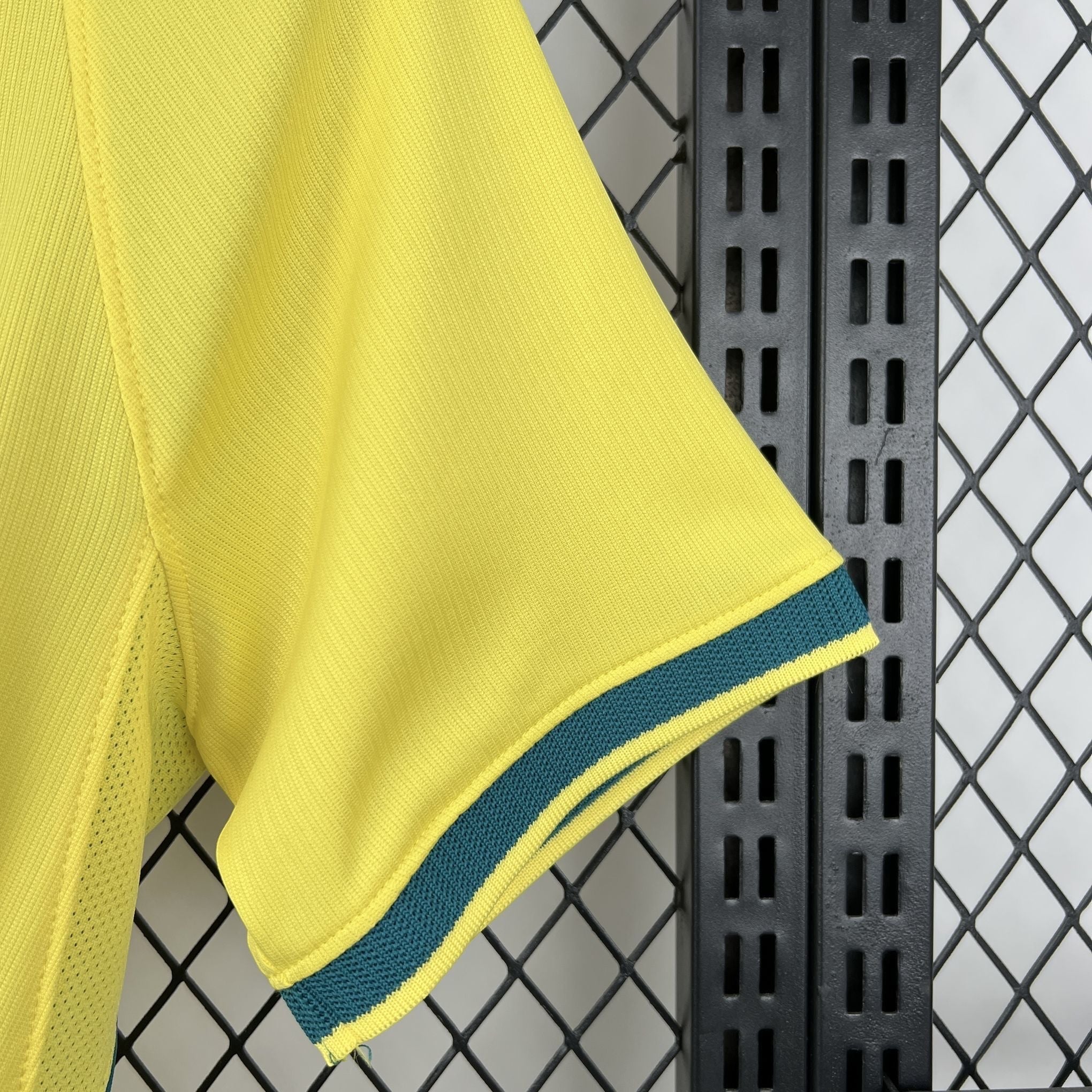 Leazofoot BRÉSIL 2026 home jersey in yellow with green trim on the sleeves.
