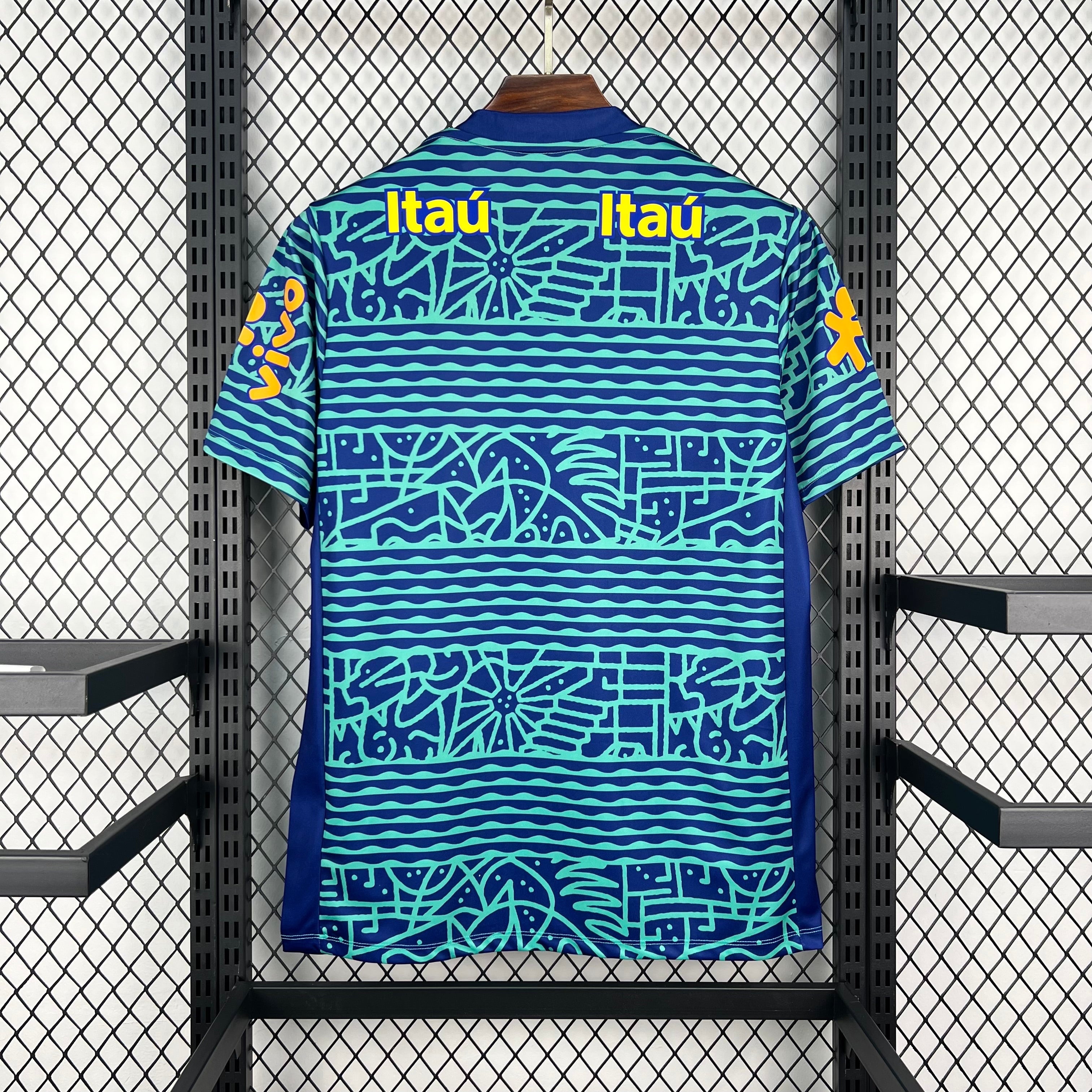 Leazofoot BRÉSIL 2026 pre-match jersey with blue and teal abstract pattern and yellow Itaú logos.