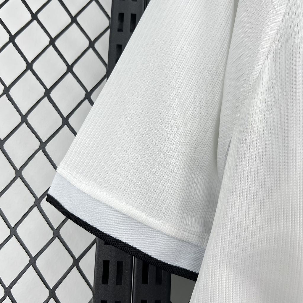 Leazofoot Canada 2026 third soccer jersey sleeve in white with ribbed texture and black and white trim detail.