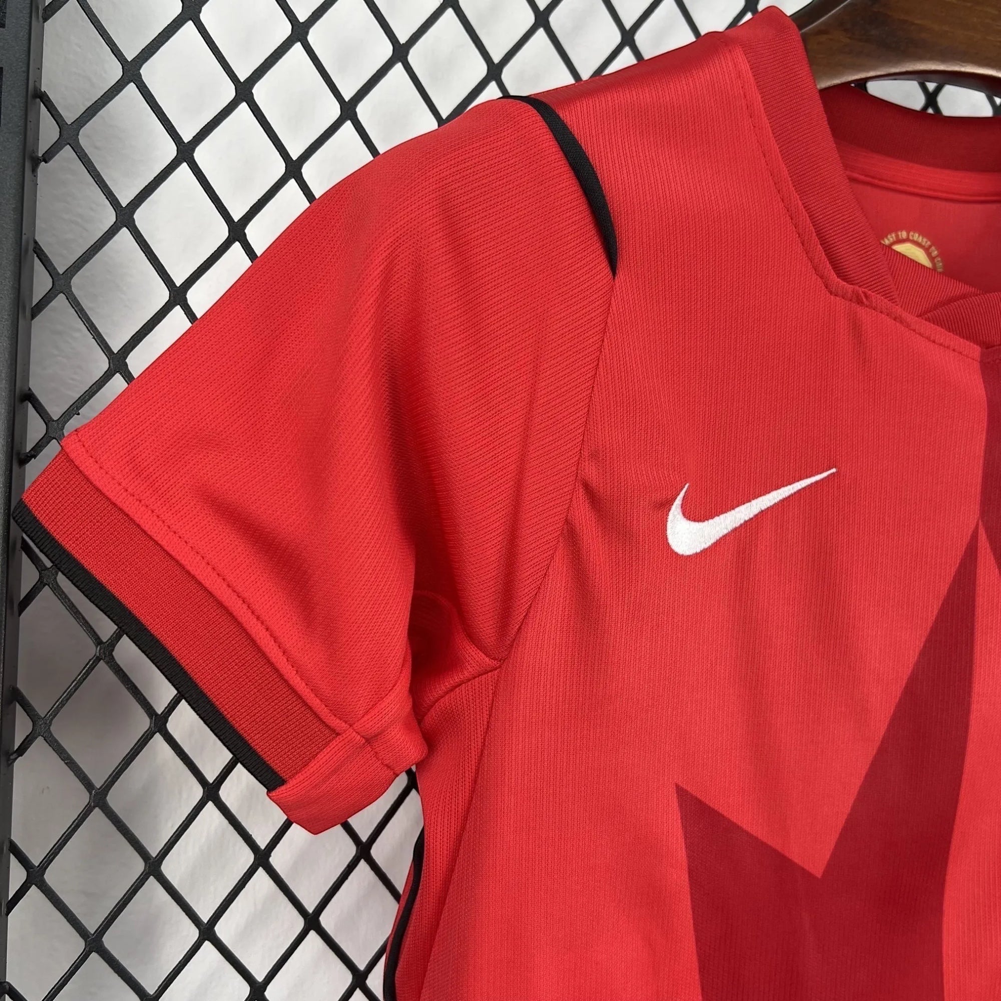 Leazofoot Canada Soccer National Team red jersey and shorts set with Nike swoosh and Canada Soccer emblem.