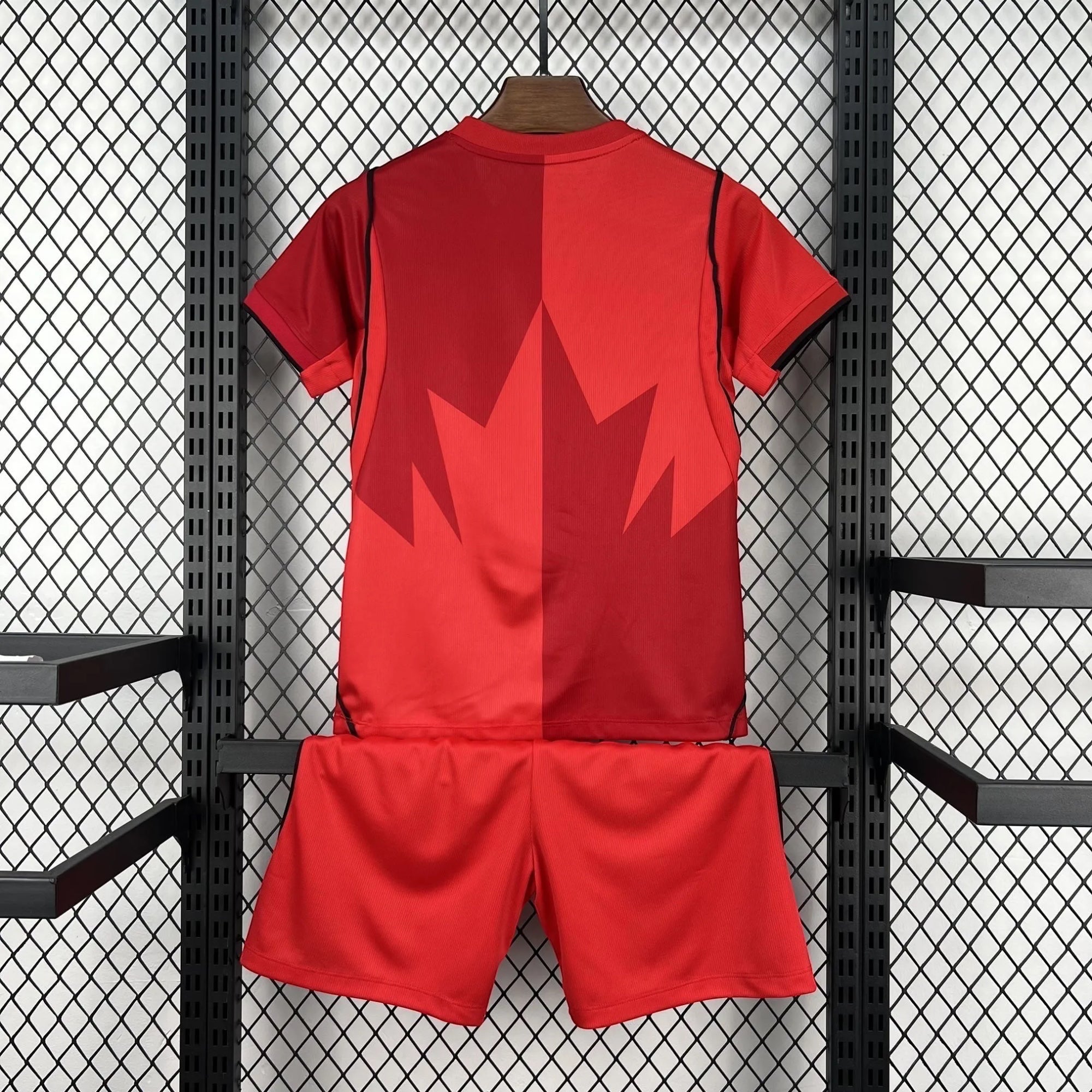 Leazofoot Canada Soccer National Team red jersey and shorts set with maple leaf graphic. Breathable fabric.