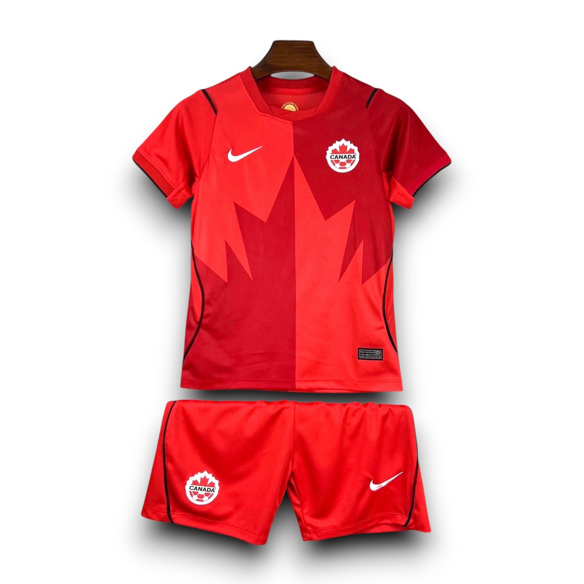 Leazofoot Canada Soccer National Team red jersey and shorts set with maple leaf graphic and Nike logo.