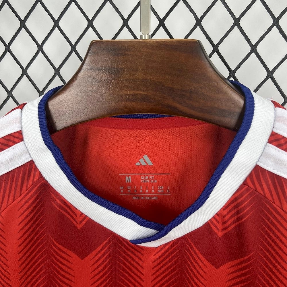 Leazofoot Chile 2026 home soccer jersey featuring a red slim fit design with white and blue collar details.