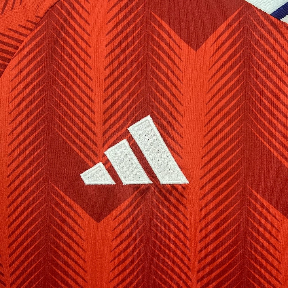 Leazofoot Chile 2026 home soccer jersey featuring a red fabric with a chevron pattern and white embroidered logo.