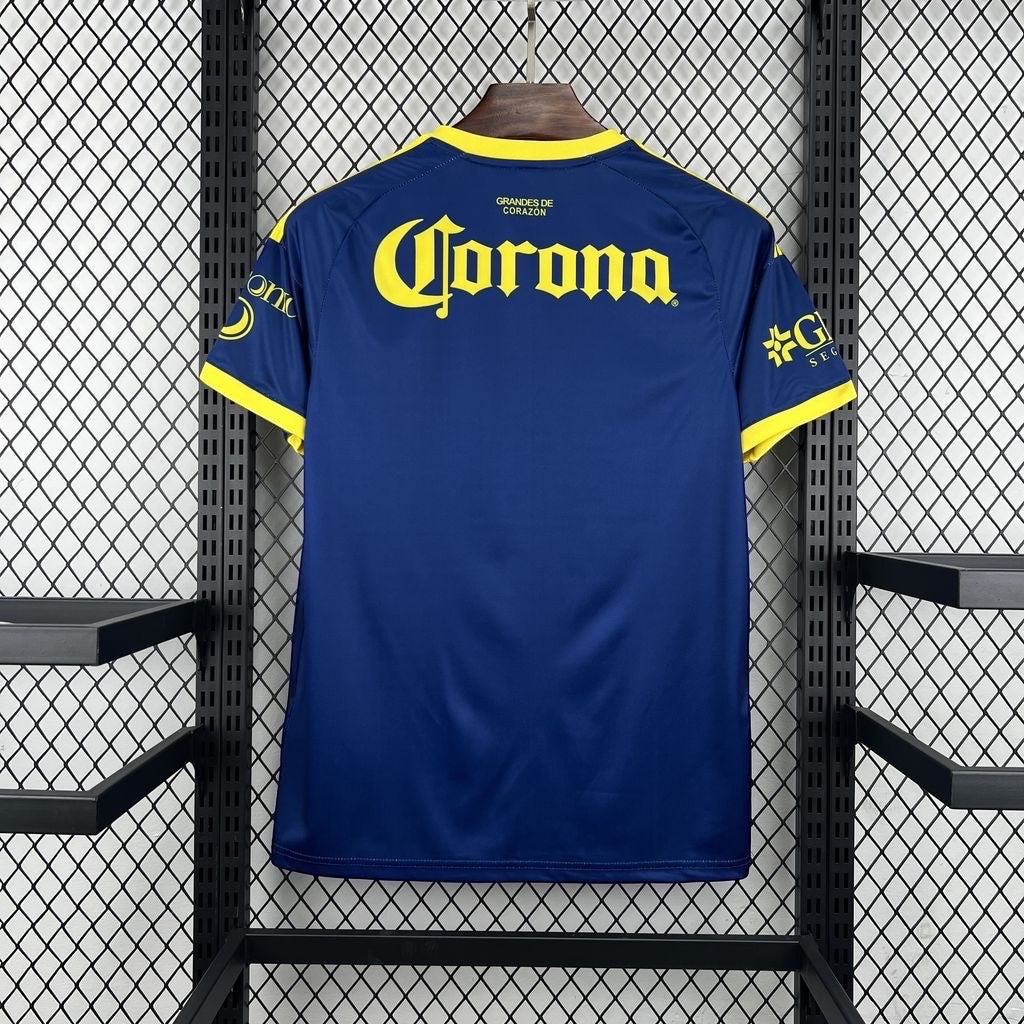 Leazofoot Club América 26/27 away jersey in navy blue with yellow accents and Corona sponsor logo on the back.