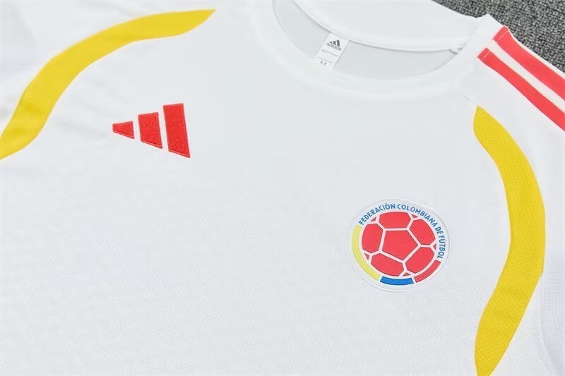 Leazofoot Colombia 2026 training jersey in white with yellow accents, red Adidas logo, and Colombian football crest.