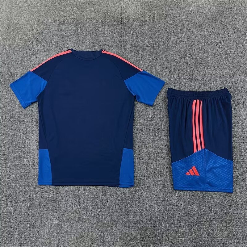 Leazofoot Colombia 2026 training set featuring a navy blue t-shirt and matching shorts with bright coral accents.