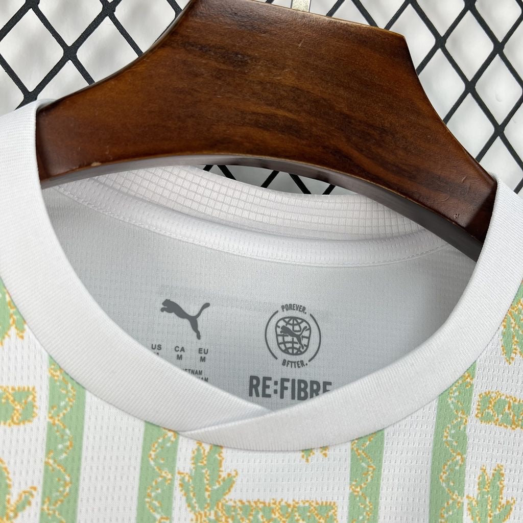 Leazofoot Côte d'Ivoire 2026 away jersey featuring white fabric with green and yellow patterned vertical stripes.