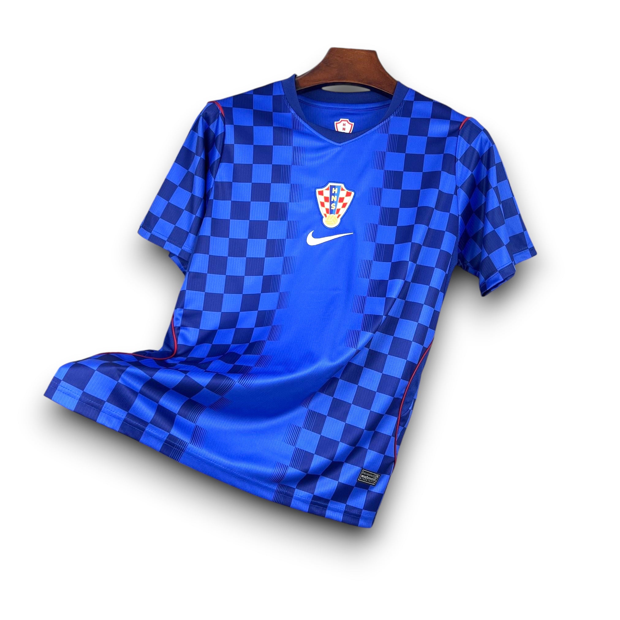 Leazofoot Croatia 2026 away soccer jersey with blue checkerboard pattern and red trim.