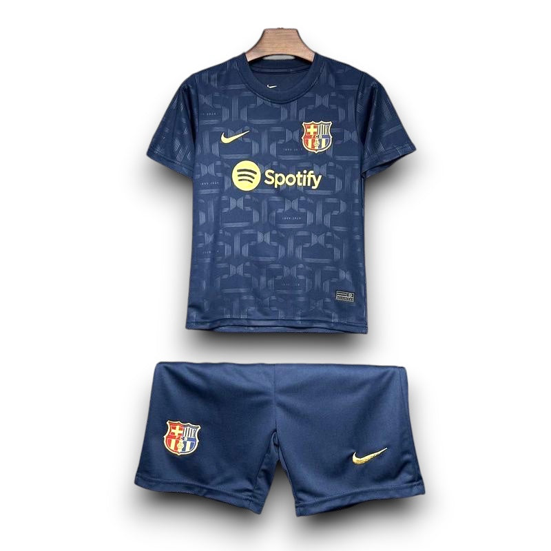 Leazofoot FC Barcelona 125th anniversary kids kit in navy blue with gold accents and patterned fabric