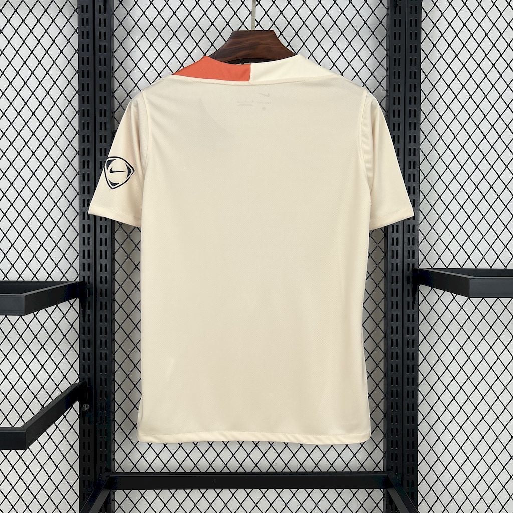 Leazofoot FC Barcelona 24/25 training jersey in cream with orange neck detail and black sleeve logo, back view