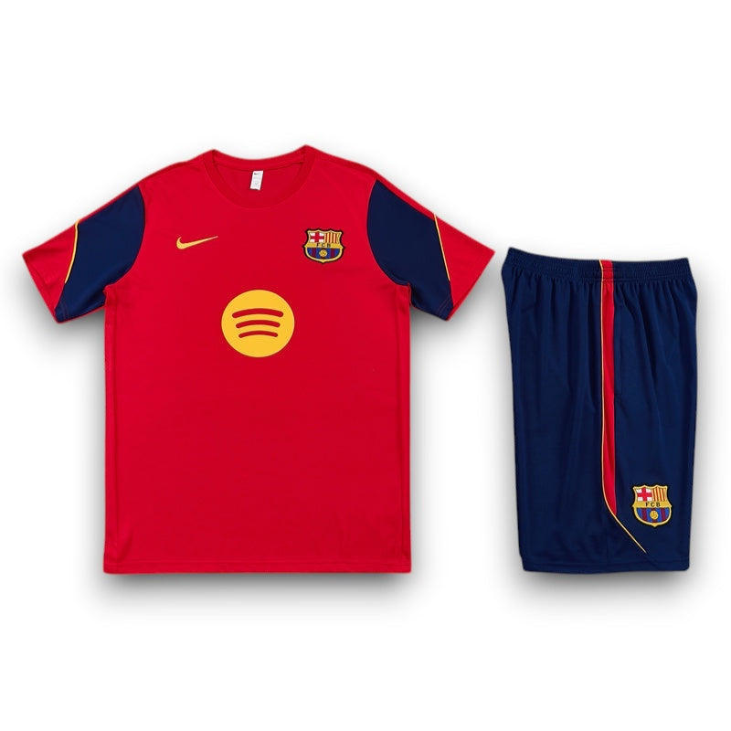 Leazofoot FC Barcelona 26/27 training kit featuring a red and navy jersey with Spotify logo and matching navy shorts.