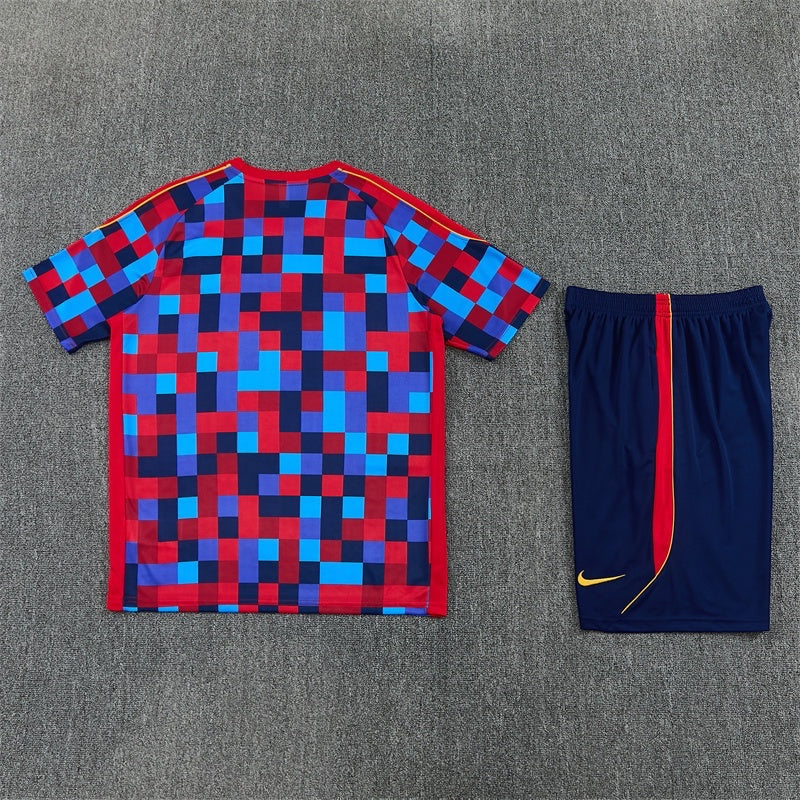 Leazofoot FC Barcelona 26/27 training kit featuring a blue and red pixelated jersey and matching navy shorts