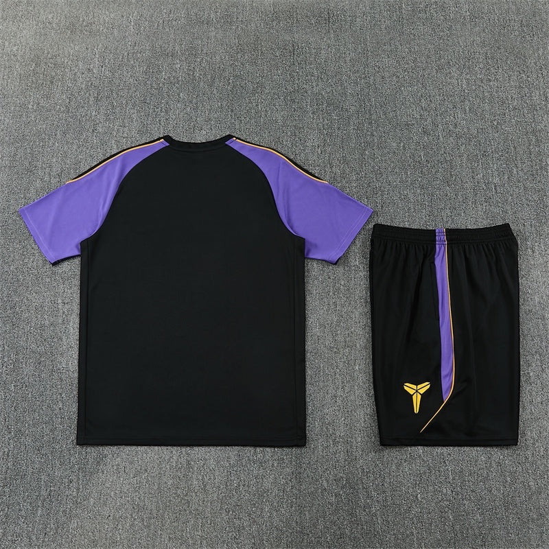 Leazofoot FC Barcelona 26/27 training set featuring a black and purple jersey with matching shorts and yellow logo