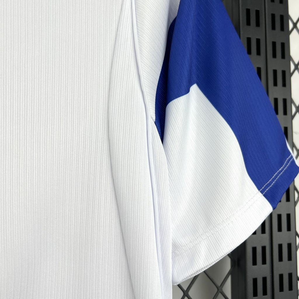 Leazofoot Finland 2026 home soccer jersey in white with blue sleeve detailing and textured performance fabric.