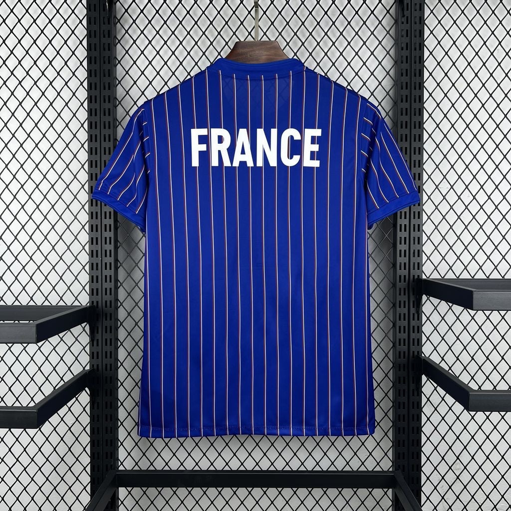 Leazofoot France 2026 pre-match jersey in blue with white and red vertical pinstripes and white back lettering.