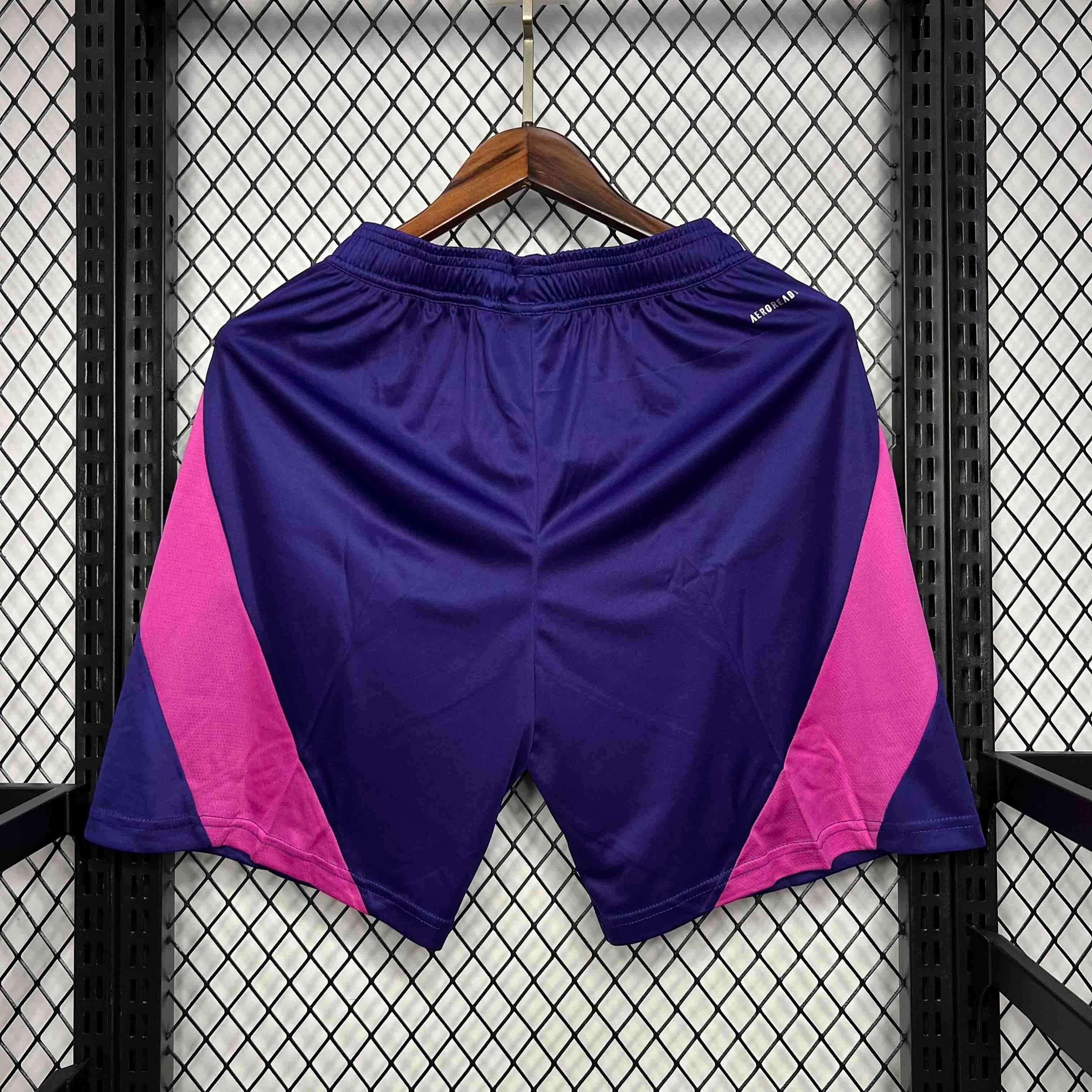 Leazofoot Germany 2024 away football shorts in purple with pink side panels and AEROREADY fabric technology.