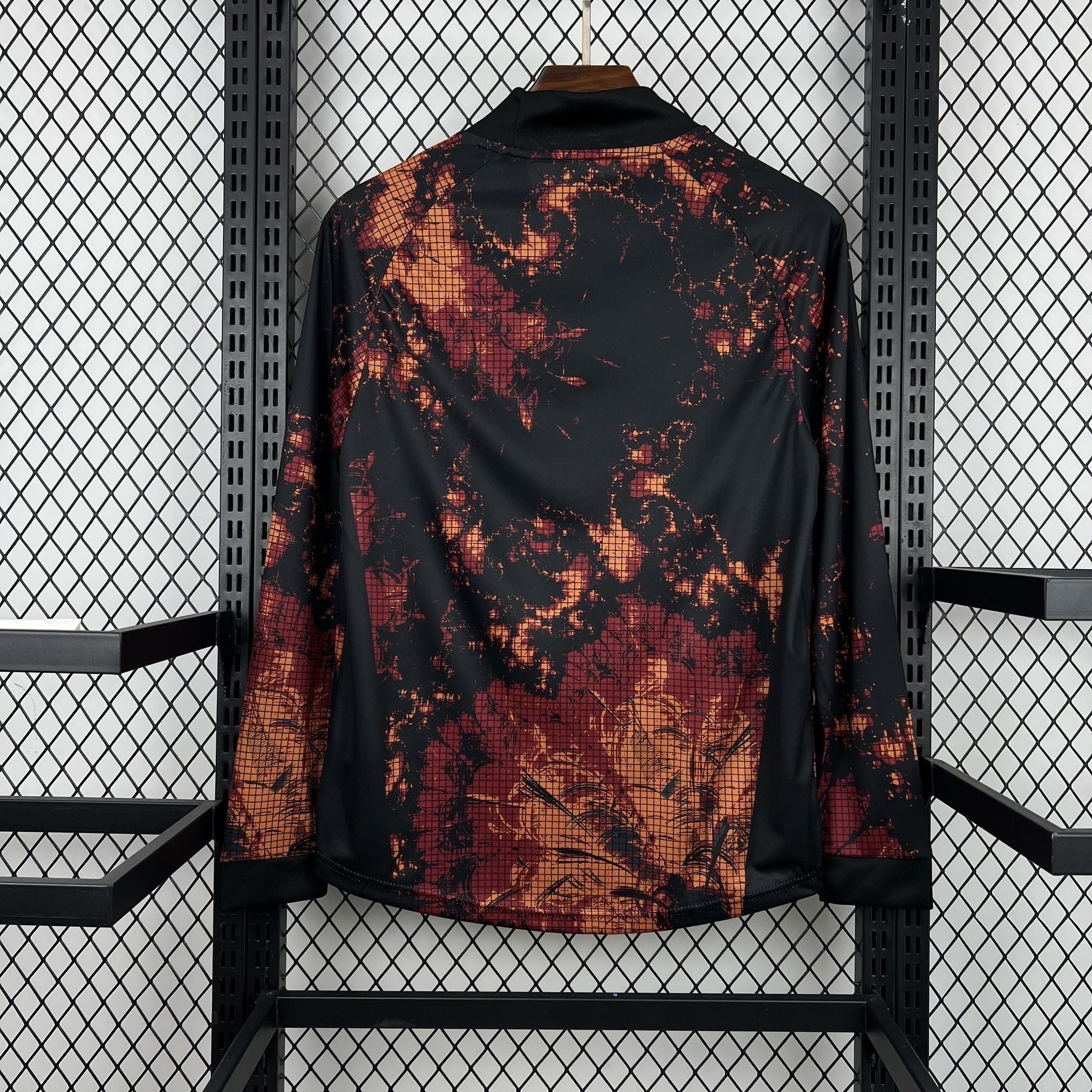 Leazofoot long-sleeve goalkeeper jersey with a black, red, and orange abstract tie-dye pattern.