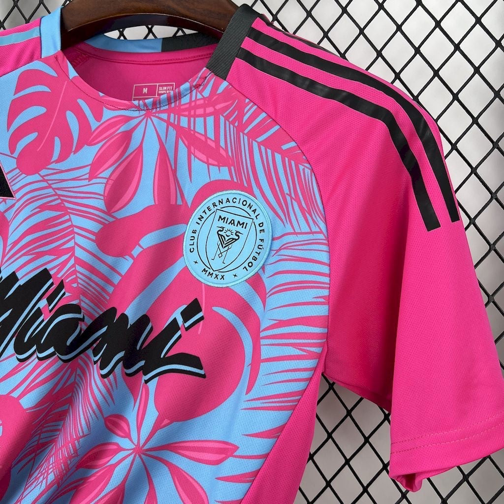 Leazofoot INTER MIAMI 25/26 concept jersey with pink and blue tropical leaf print, black Adidas stripes on sleeves.