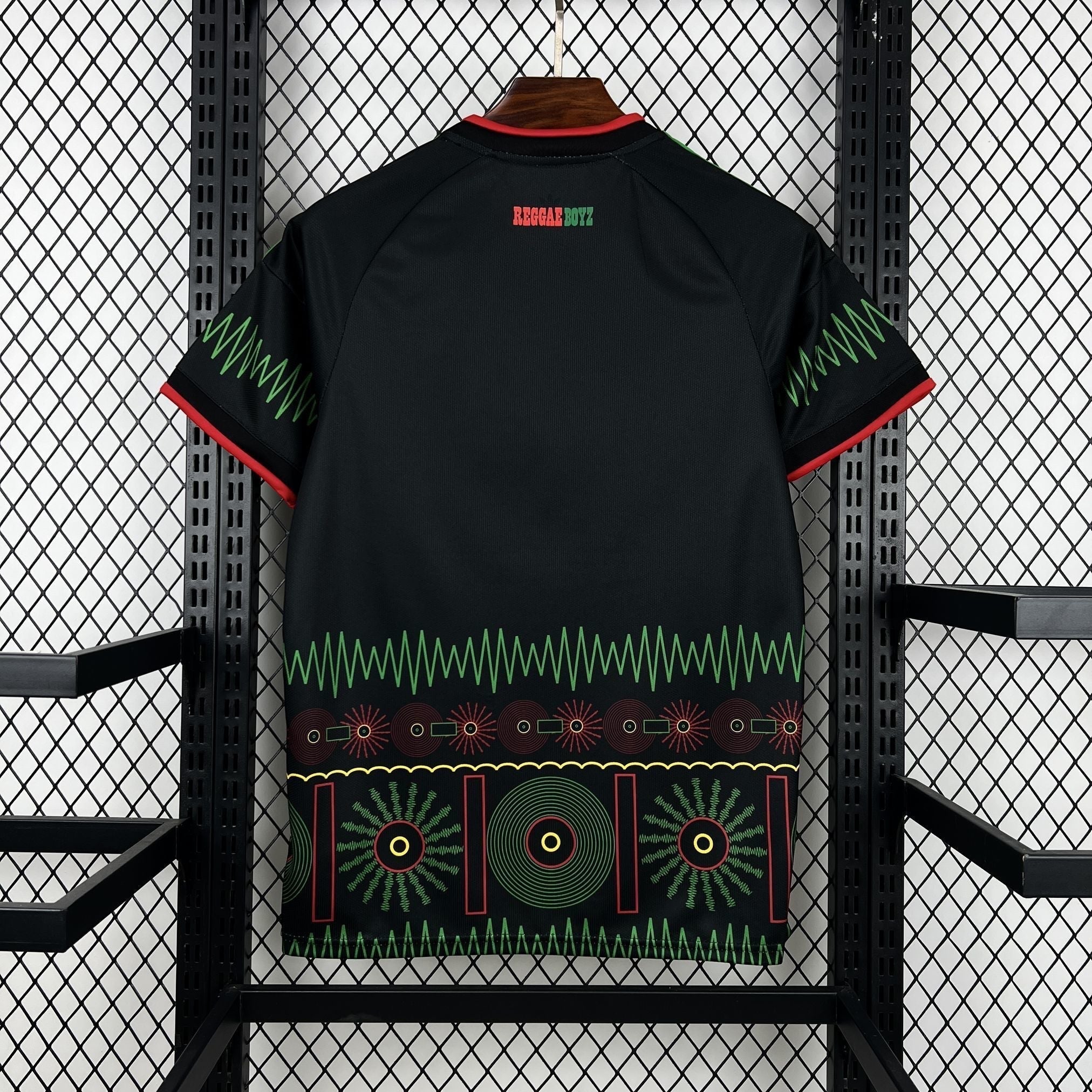 Leazofoot Jamaica 2026 away soccer jersey in black with green and red graphic patterns and Reggae Boyz back print.