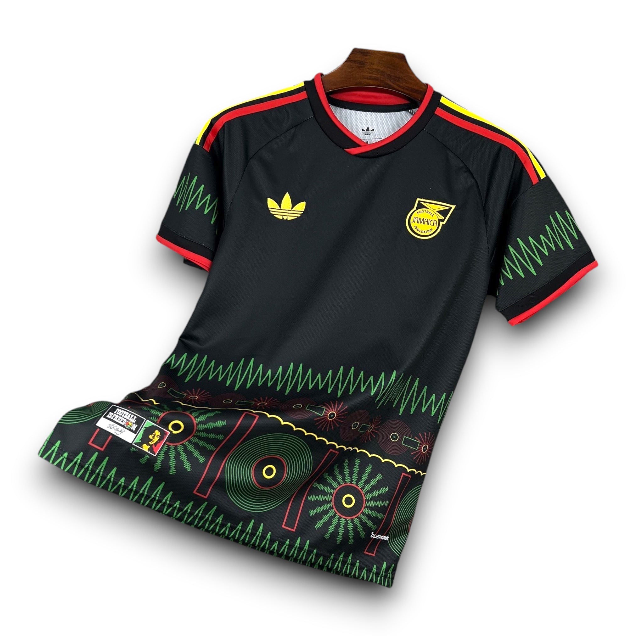 Leazofoot Jamaica 2026 away soccer jersey in black with green, yellow, and red graphic patterns and team crest.