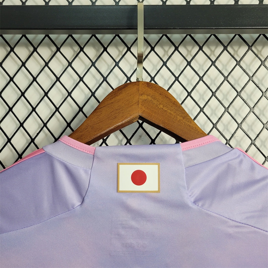 Leazofoot Japan 25/26 special edition football jersey in light purple with pink trim and Japan flag detail.