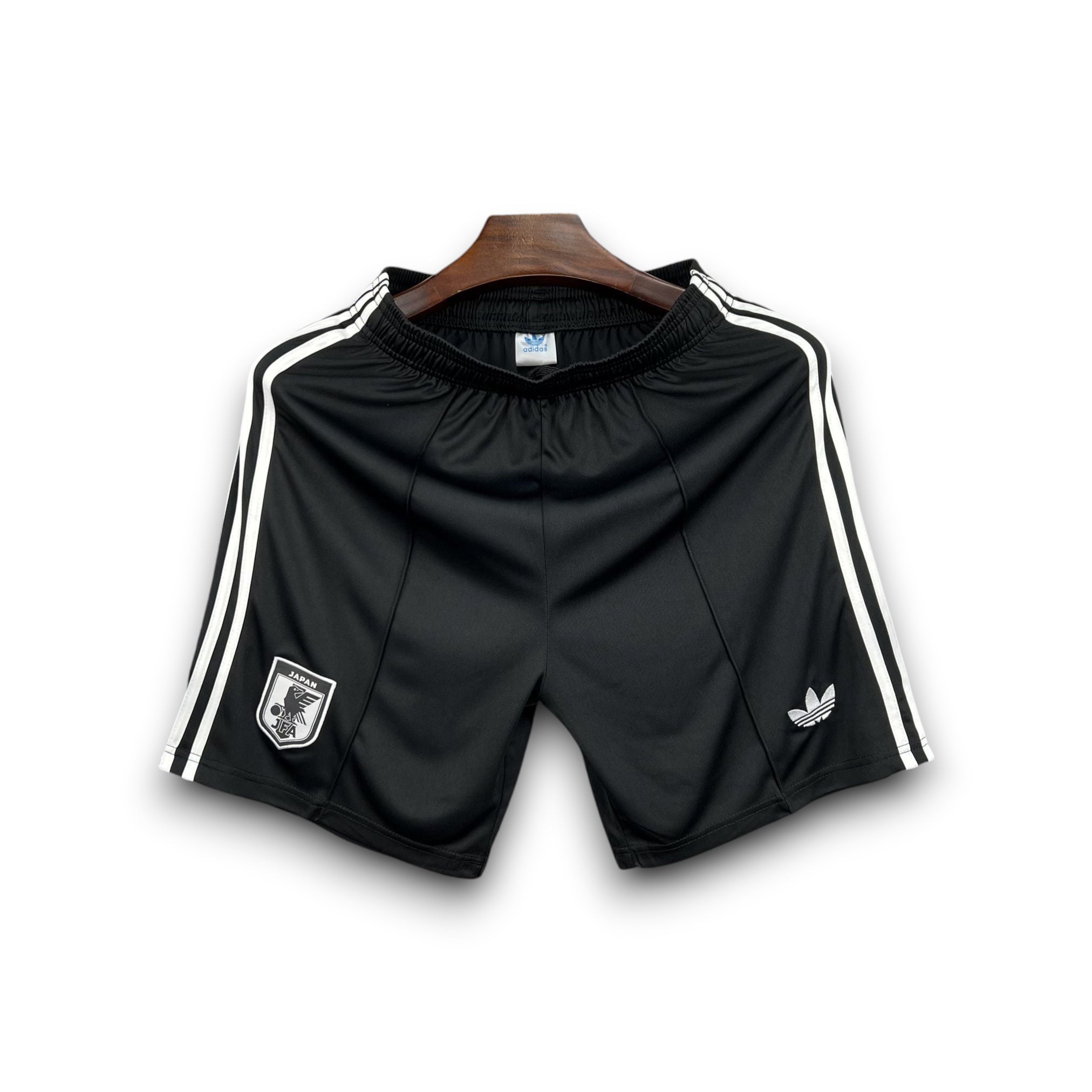 Leazofoot black athletic shorts with white stripes and Japan crest