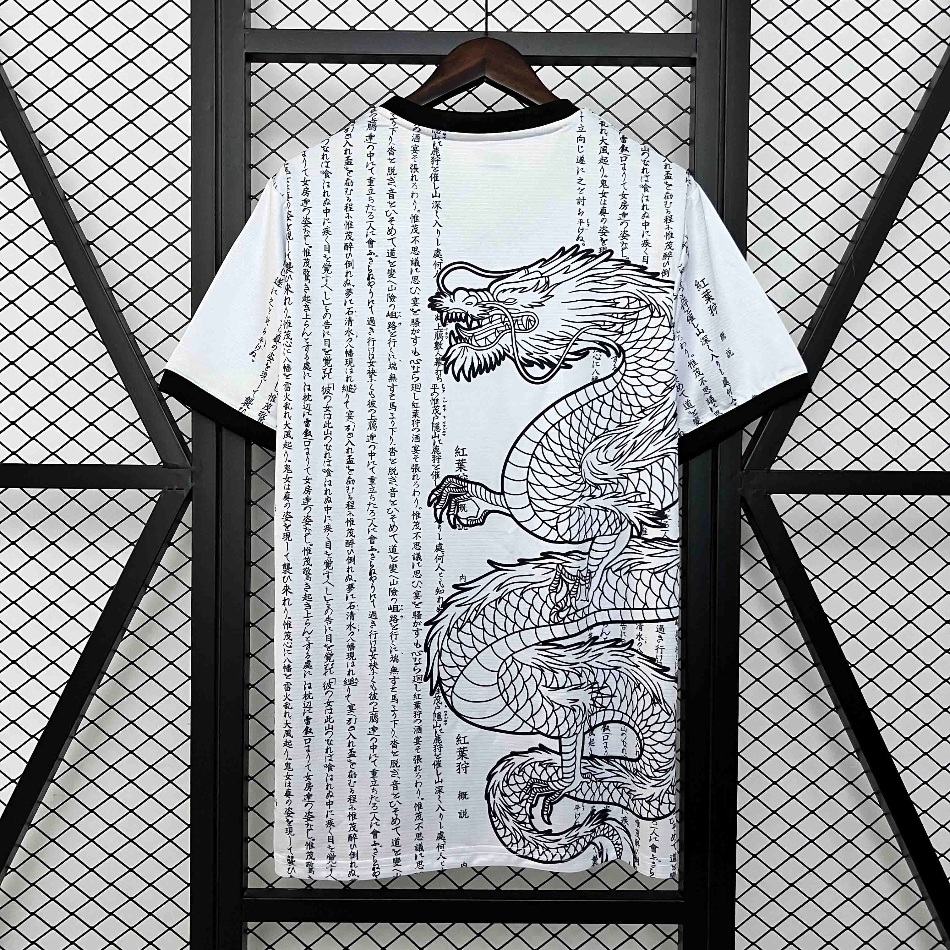 Leazofoot Japan 25/26 jersey featuring a white base with black dragon illustration and Japanese calligraphy print.