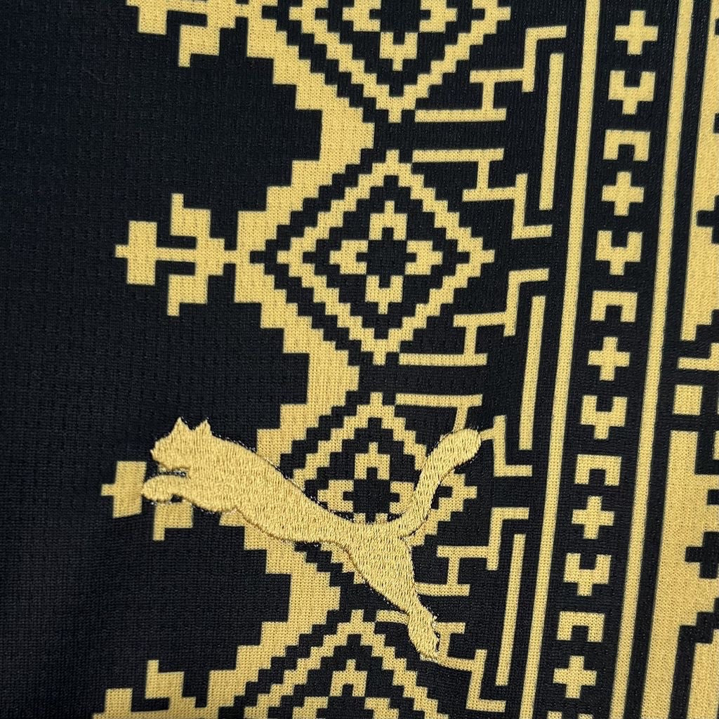 Leazofoot Maroc 2026 concept football jersey in black and gold with intricate geometric patterns and embroidered logo