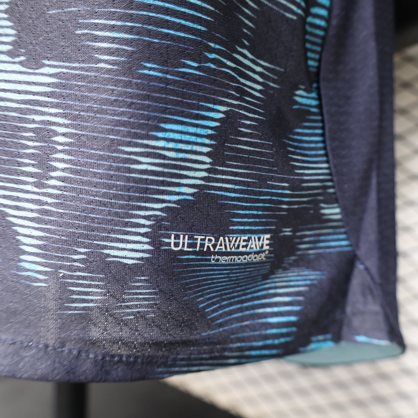 Leazofoot Olympique de Marseille 26/27 away jersey featuring dark blue fabric with light blue abstract wave patterns